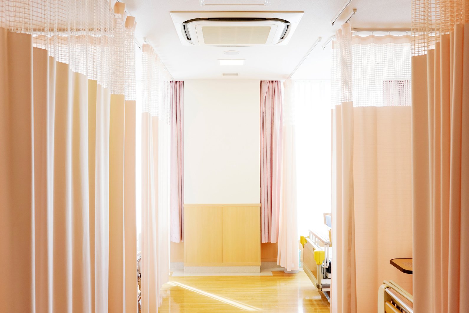 Hospital room with privacy curtain